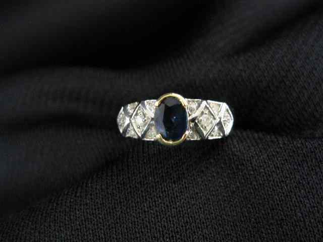 Appraisal: Sapphire Diamond Ring carat oval rich blue sapphire with diamonds