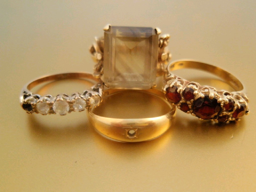 Appraisal: Four stone set dress rings