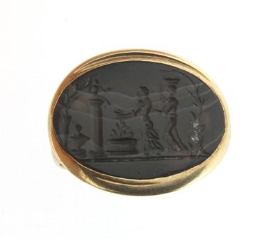 Appraisal: A banded agate intaglio ring Carved with figures and mounted