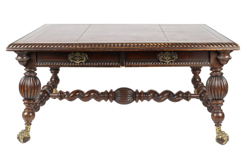 Appraisal: LEATHER-TOP CARVED WALNUT LIBRARY TABLE th century unsigned with two