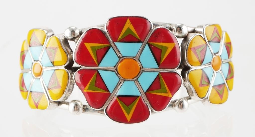 Appraisal: Sterling silver cuff bracelet featuring Native American style multi-colored flower