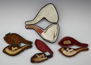 Appraisal: Group of Four Carved Meerschaum Pipes th c wi Group