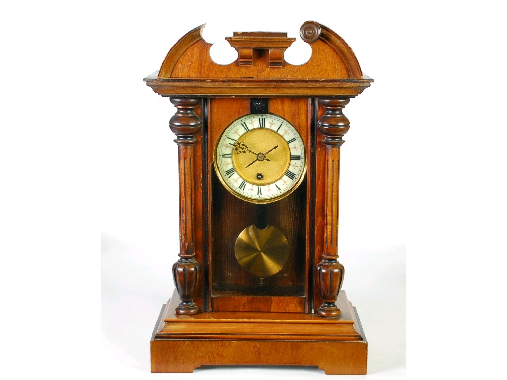 Appraisal: EARLY TWENTIETH CENTURY WALNUTWOOD MANTEL CLOCK the chapter ring enclosing