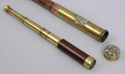 Appraisal: ENGLISH BRASS-HANDLED WALNUT WALKING STICK The cylindrial handle with applied