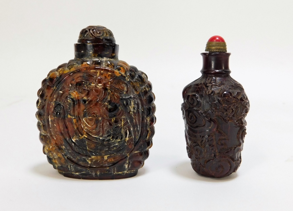 Appraisal: CHINESE DRAGON PHOENIX AMBER HORN SNUFF BOTTLES China th CenturyIncludes