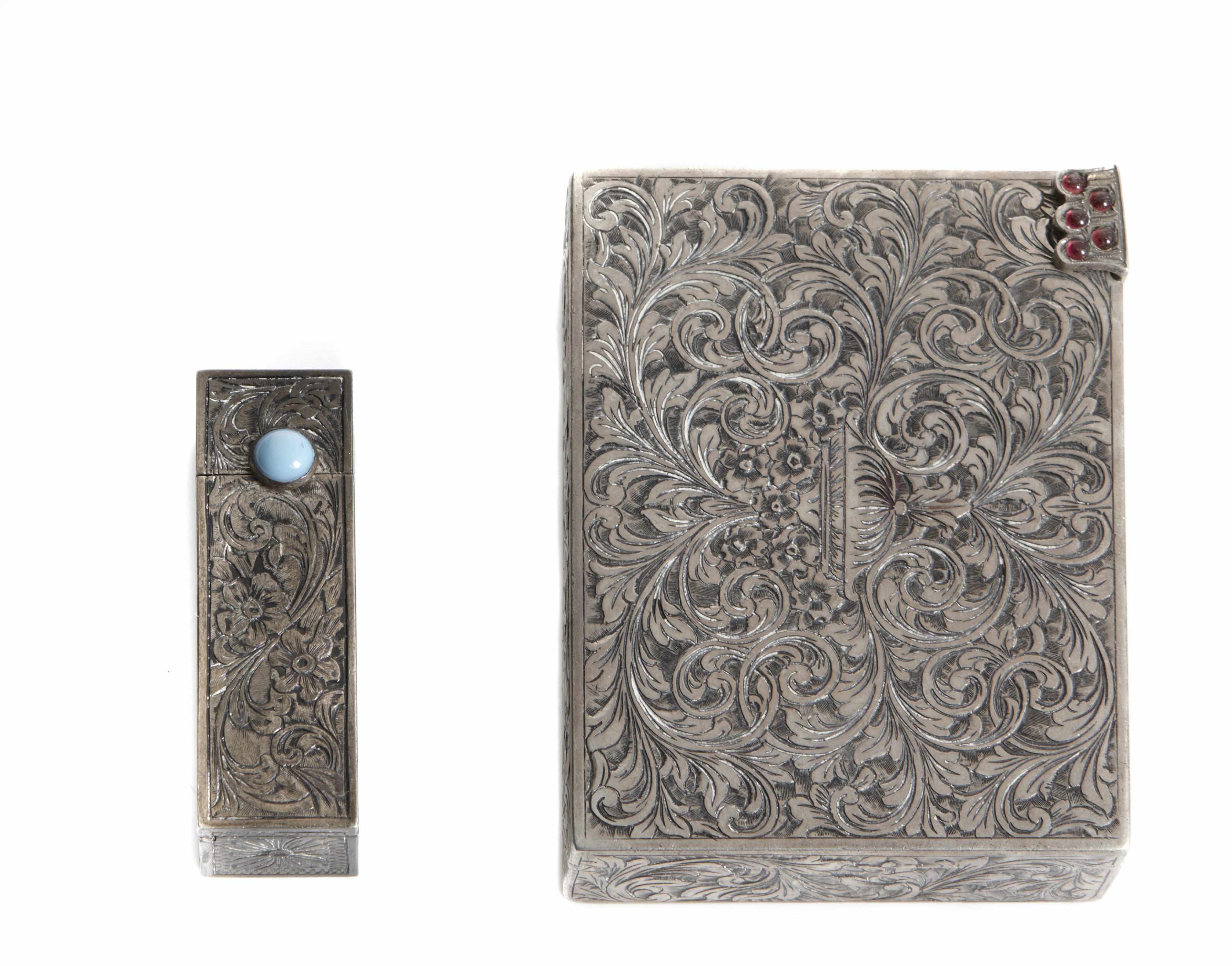 Appraisal: A turquoise and silver compact together with a redstone and