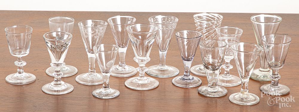 Appraisal: Fifteen colorless glass cordials Fifteen colorless glass cordials tallest Condition