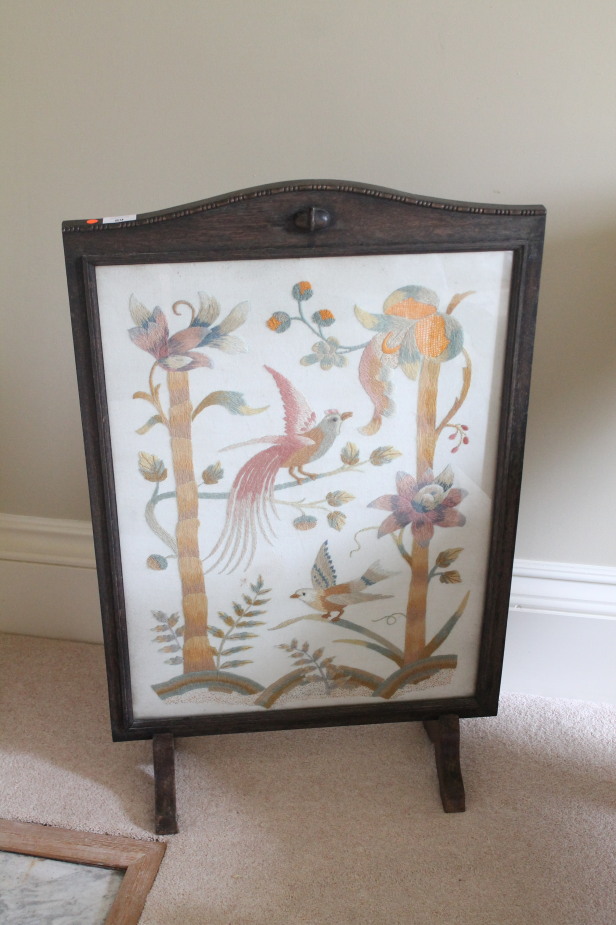 Appraisal: An oak framed needlework firescreen