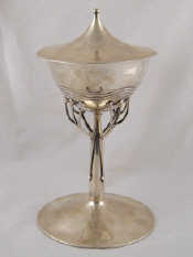 Appraisal: Archibald Knox An arts and crafts silver standing cup and