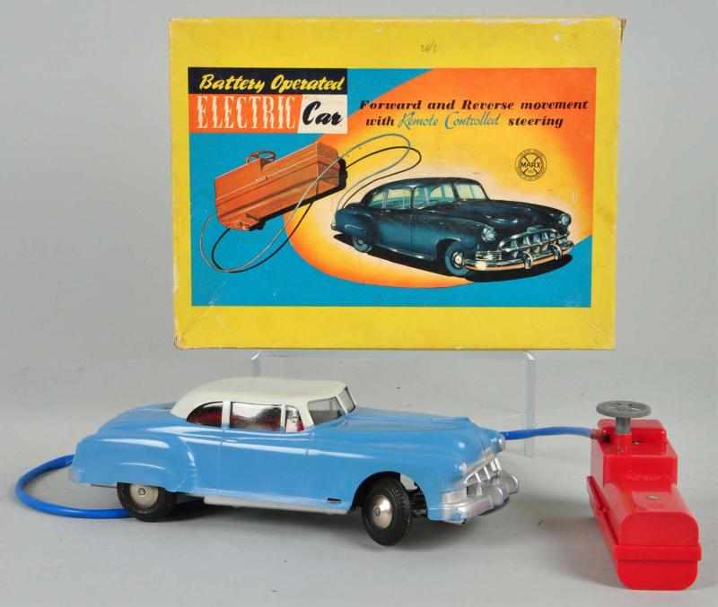 Appraisal: Plastic Marx Remote Control Sedan Battery-Op Toy Description American Working