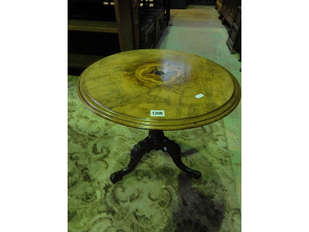 Appraisal: A walnut and figured walnut veneered occasional table of circular