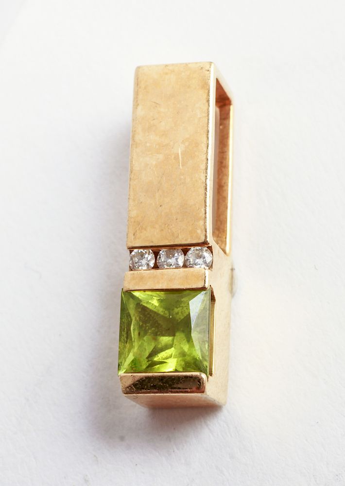 Appraisal: K Yellow Gold Peridot Diamonds Pendant K yellow gold square-cut