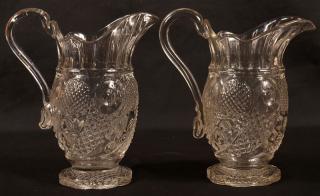 Appraisal: Two Colorless Flint Glass Cream Pitchers Two Colorless Flint Glass