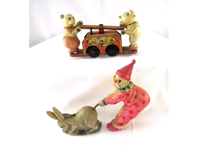 Appraisal: Celluloid Windup Figures Includes Two celluloid bears on a tin