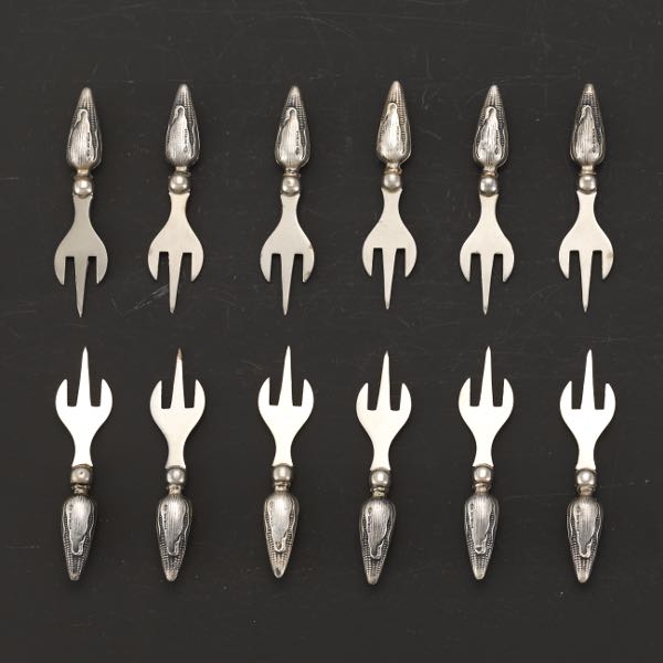 Appraisal: TWELVE WEBSTER STERLING SILVER CORN SKEWERS Six pairs of sterling