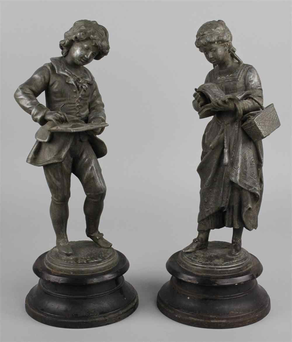 Appraisal: PAIR OF WHITE METAL FIGURES OF CHILDREN late th century