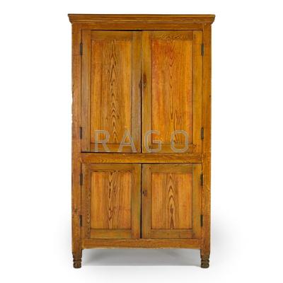 Appraisal: AMERICAN WALL CUPBOARD Yellow pine paneled doors th c x