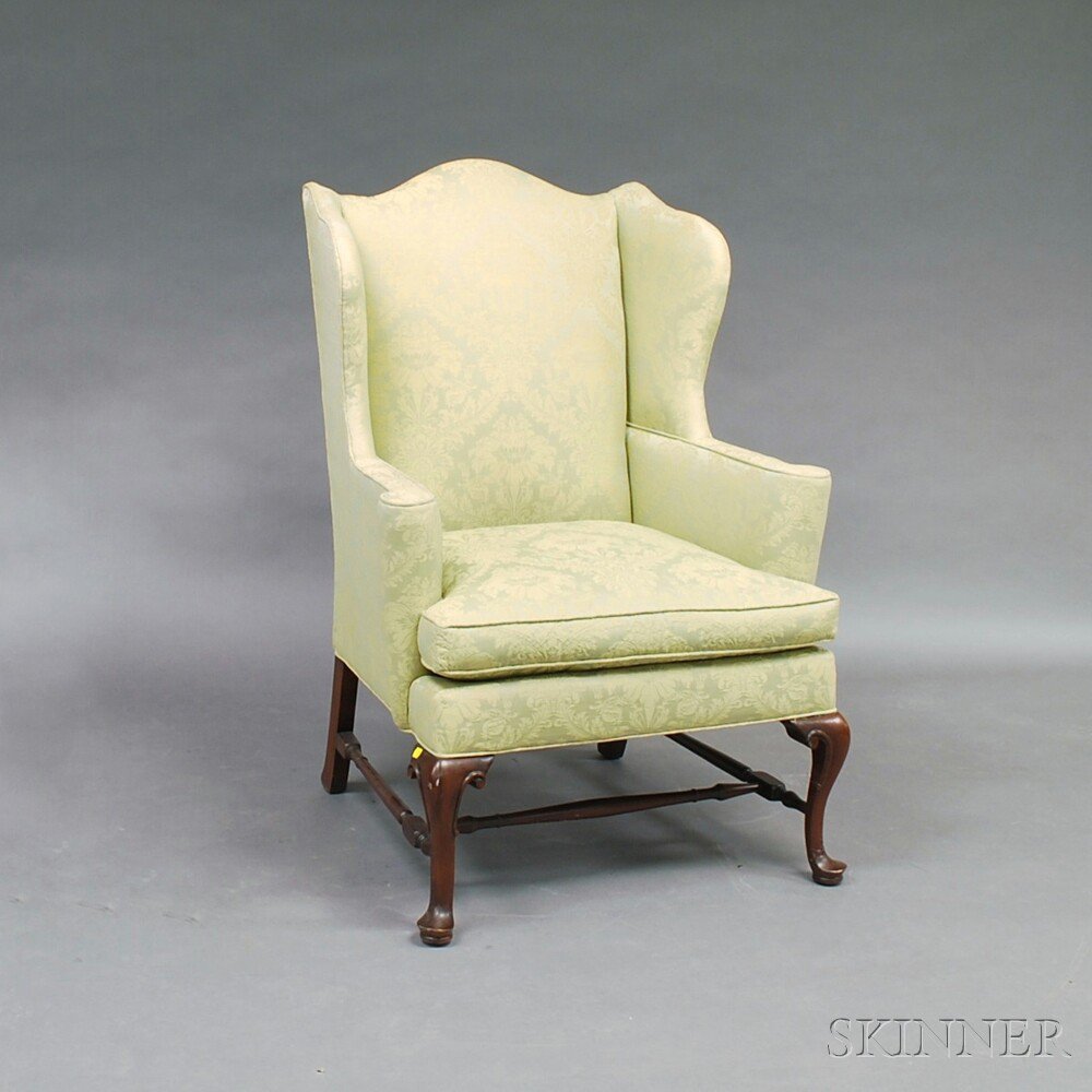 Appraisal: Queen Anne-style Carved Mahogany Wing Chair ht wd dp in