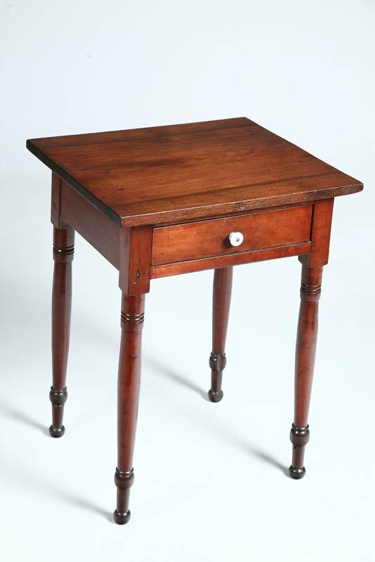 Appraisal: ONE DRAWER STAND Walnut with a porcelain pull ring turned