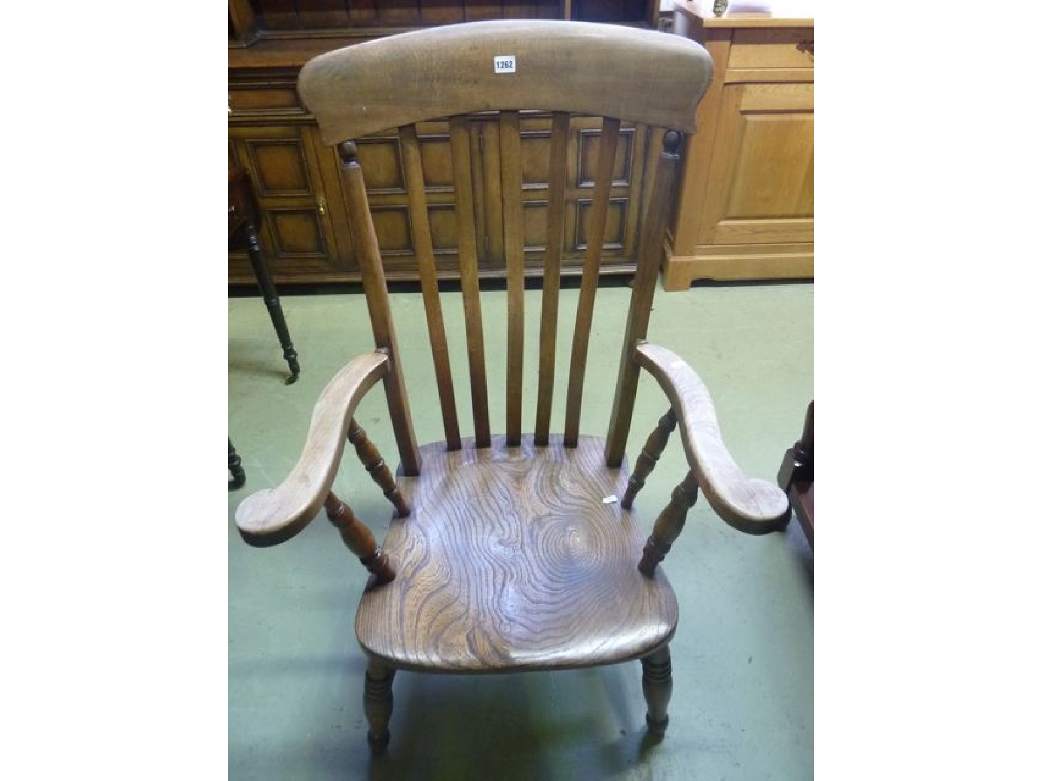 Appraisal: A Victorian elm and beechwood Windsor lath back elbow chair