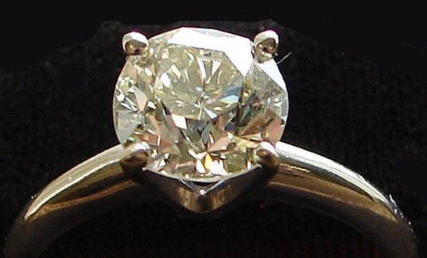 Appraisal: KW one cushion cut diamond ct color MN clarity VS