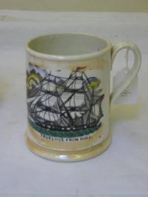 Appraisal: A SUNDERLAND YELLOW LUSTRE POTTERY FROG MUG printed with a