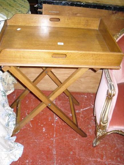 Appraisal: A mahogany butlers tray on stand