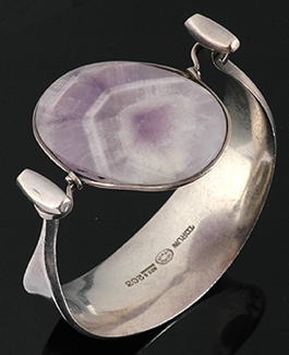 Appraisal: A silver and amethyst bangle by Georg Jensen Designed by