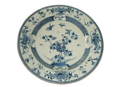 Appraisal: A pair of Nankin blue and white plates painted sprays