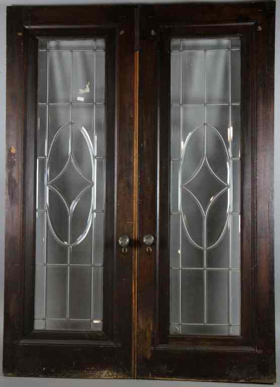 Appraisal: Pair of American Mahogony Leaded Glass DoorsWith fine leading and