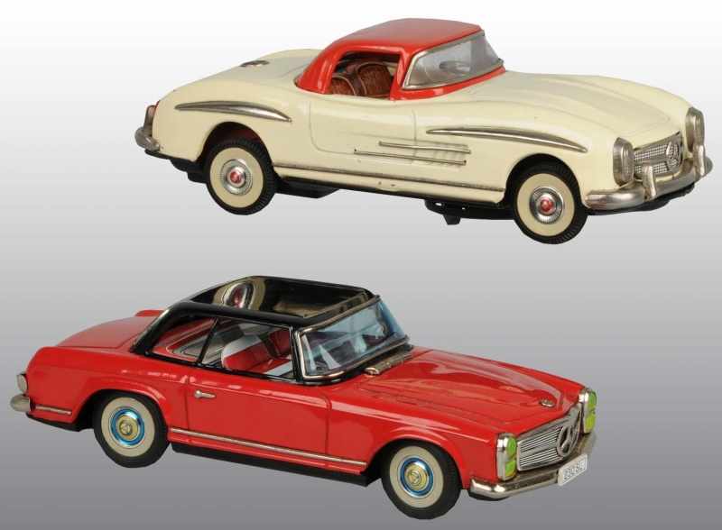 Appraisal: Lot of Tin Mercedes Battery-Operated Toys Description Japanese Working Includes