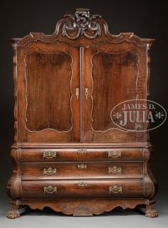 Appraisal: CARVED OAK TRANSITIONAL ROCOCO DOUBLE DOOR BOMBE CABINET th century