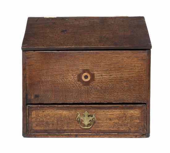 Appraisal: An American Oak Letterbox having a slant front with hinged