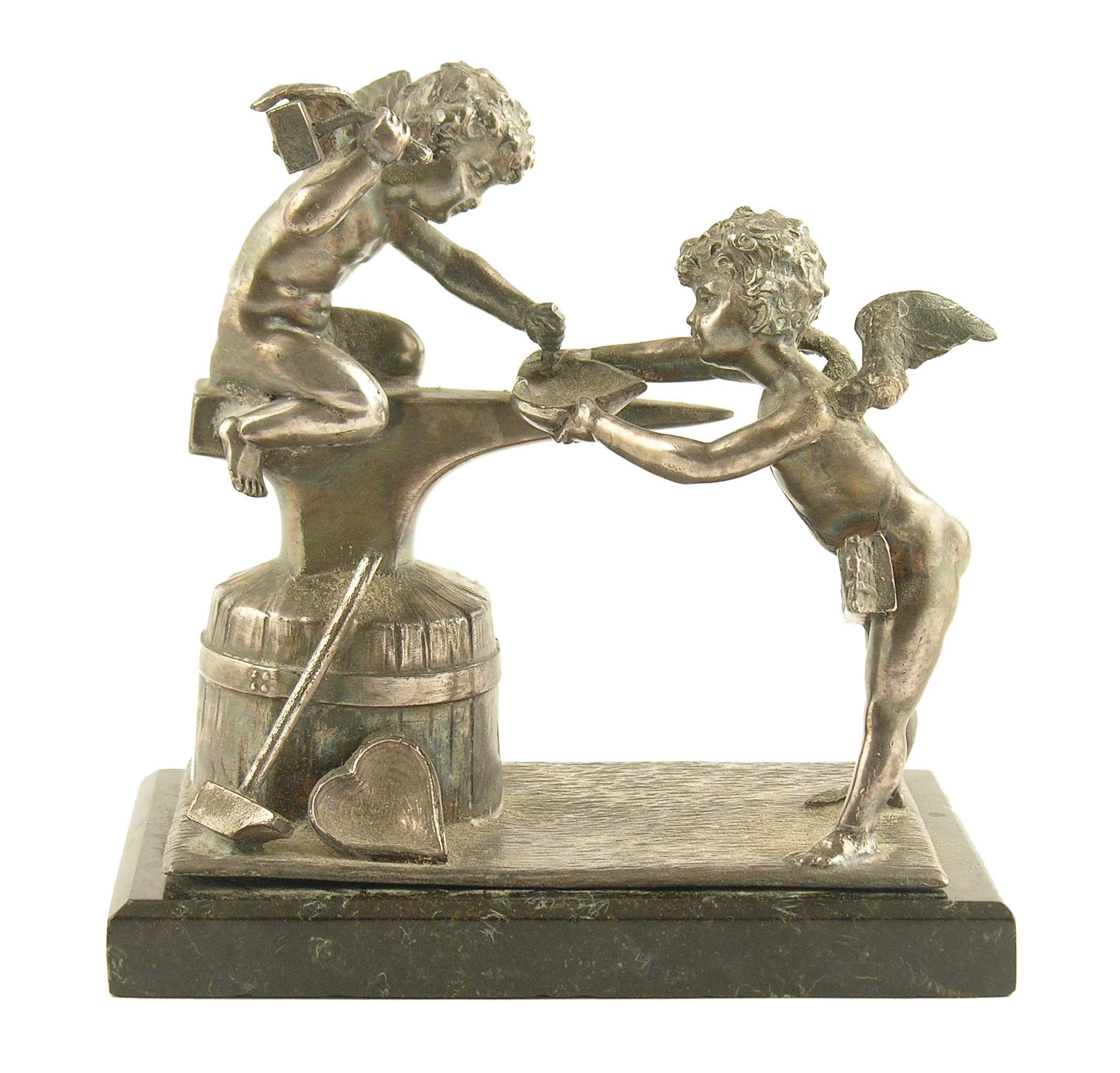 Appraisal: A plated group of two putti