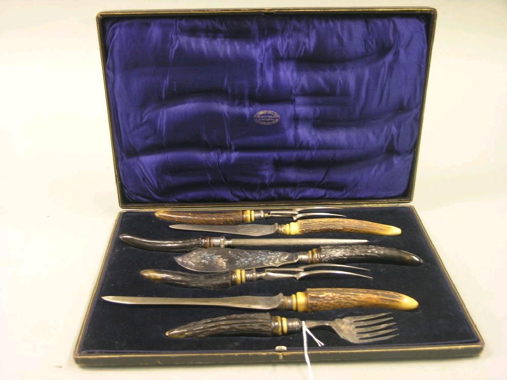 Appraisal: A late Victorian carving set seven pieces including fish servers