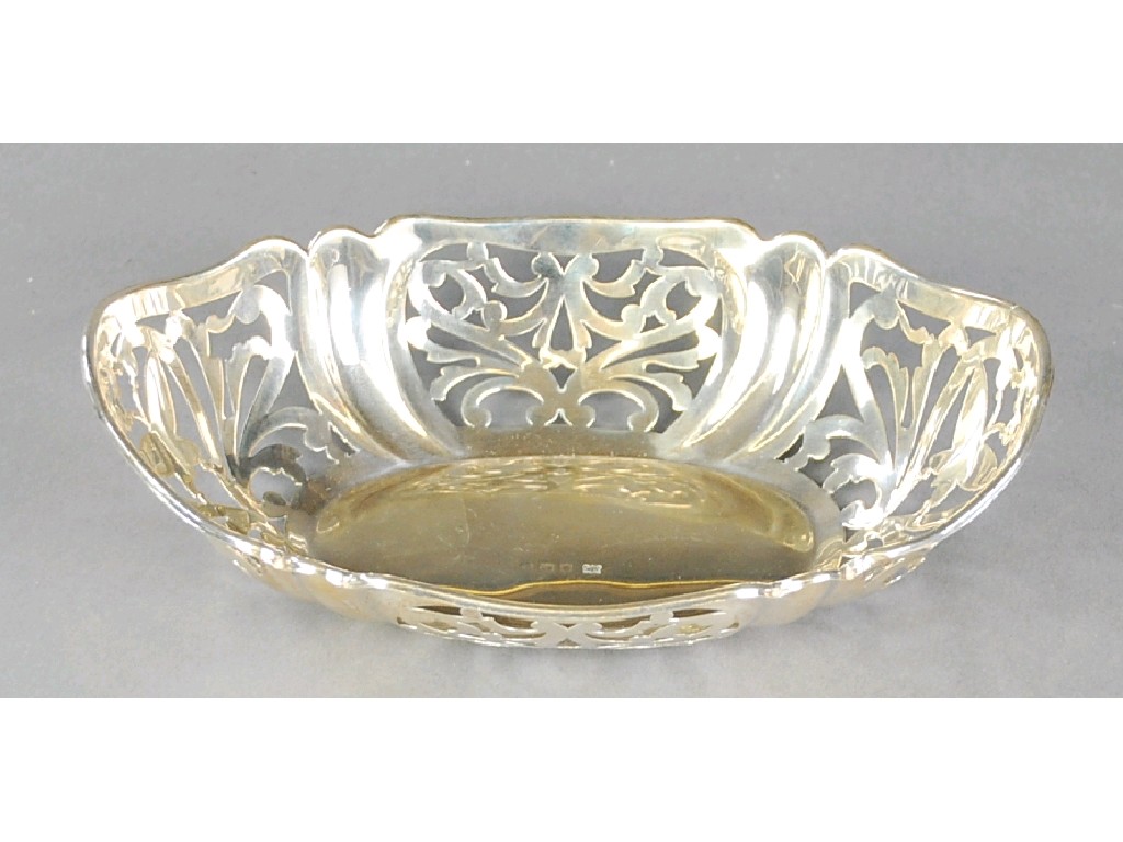 Appraisal: SILVER OVAL SMALL BOWL the sides with four fluted and