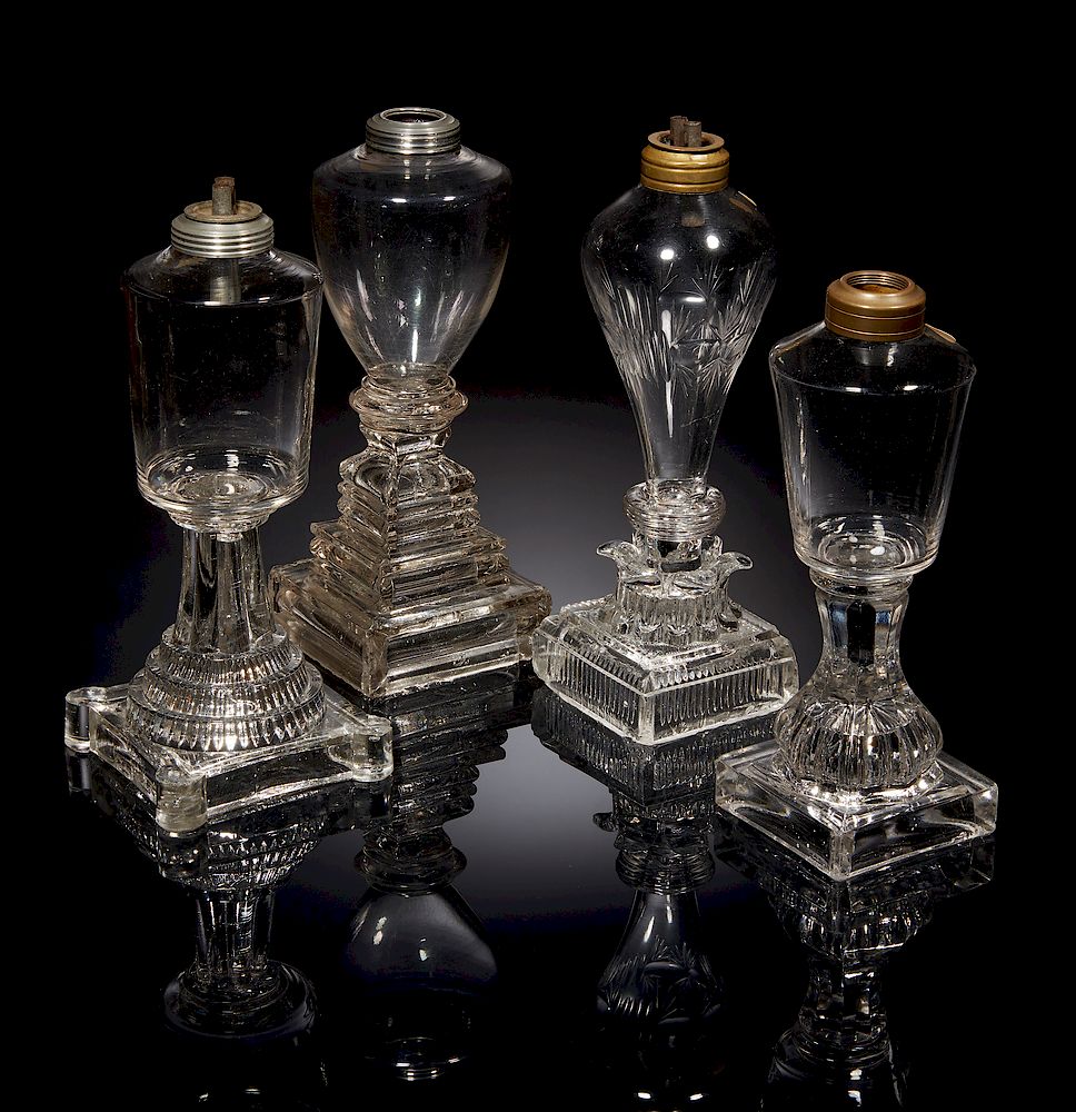 Appraisal: Four Glass Whale Oil Lamps Lot of four assorted clear