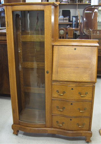 Appraisal: LATE VICTORIAN OAK SECRETARY BOOKCASE American c - The left