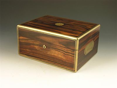 Appraisal: A Victorian coromandel brass bound and strung box the hinged