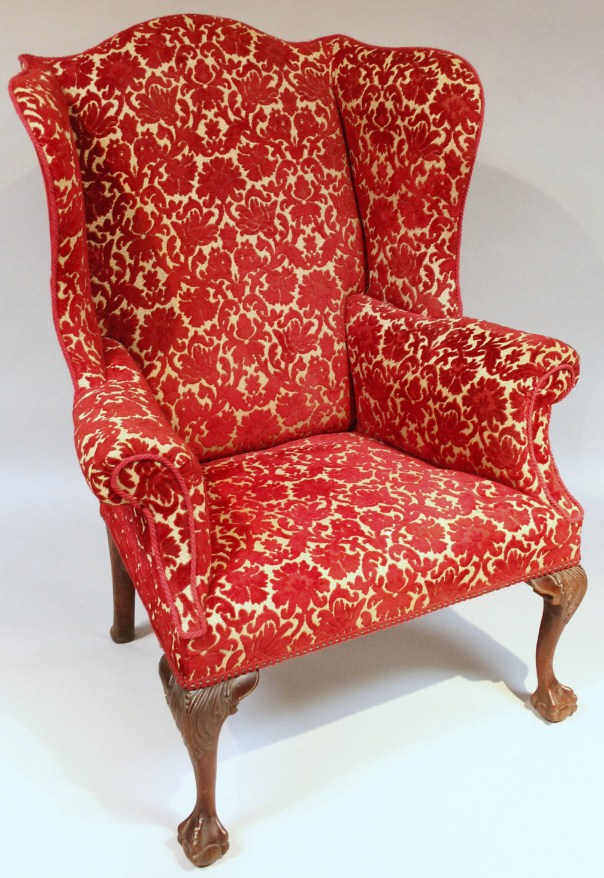 Appraisal: A George III mahogany framed wing armchair the back arms