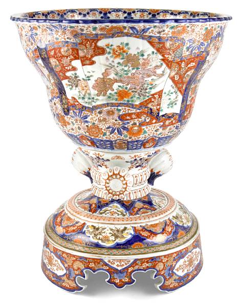 Appraisal: An imposing Japanese Imari porcelain jardini re on stand circa