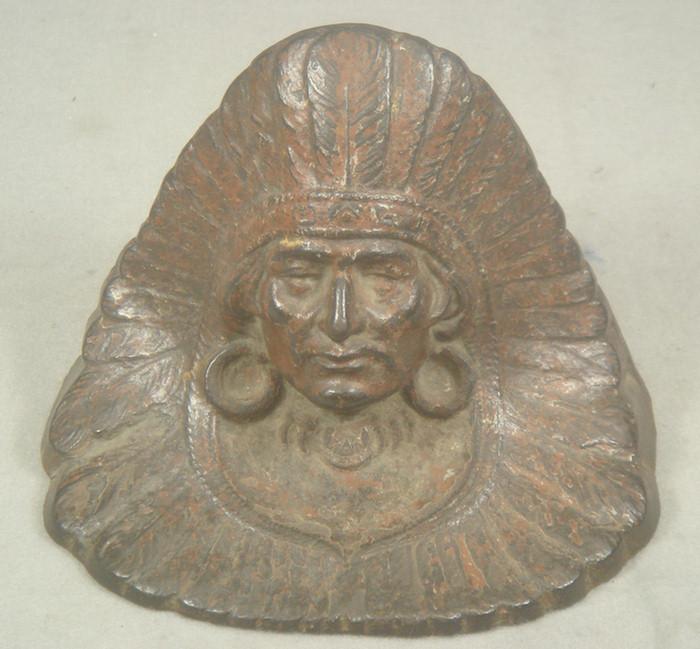 Appraisal: Cast iron doorstop hollow back brown Indian bust with decorative