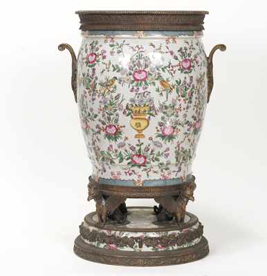 Appraisal: A Monumental Porcelain Jardiniere with Metal Mounts Oversized porcelain jardiniere