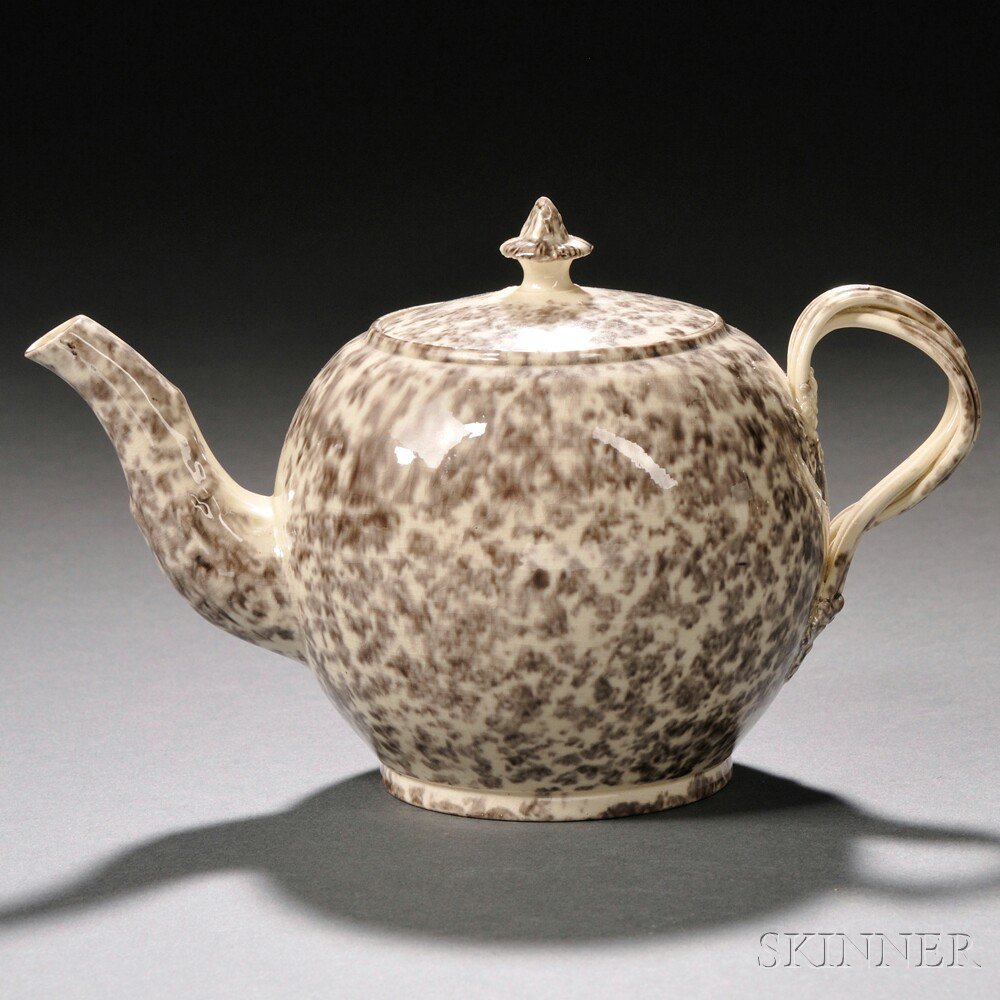 Appraisal: Staffordshire Cream-colored Earthenware Teapot and Cover England c globular with