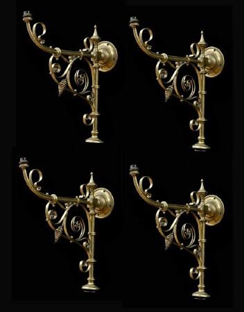 Appraisal: FOUR ENGLISH ARTS AND CRAFTS BRASS BRACKET SCONCES With scrollwork