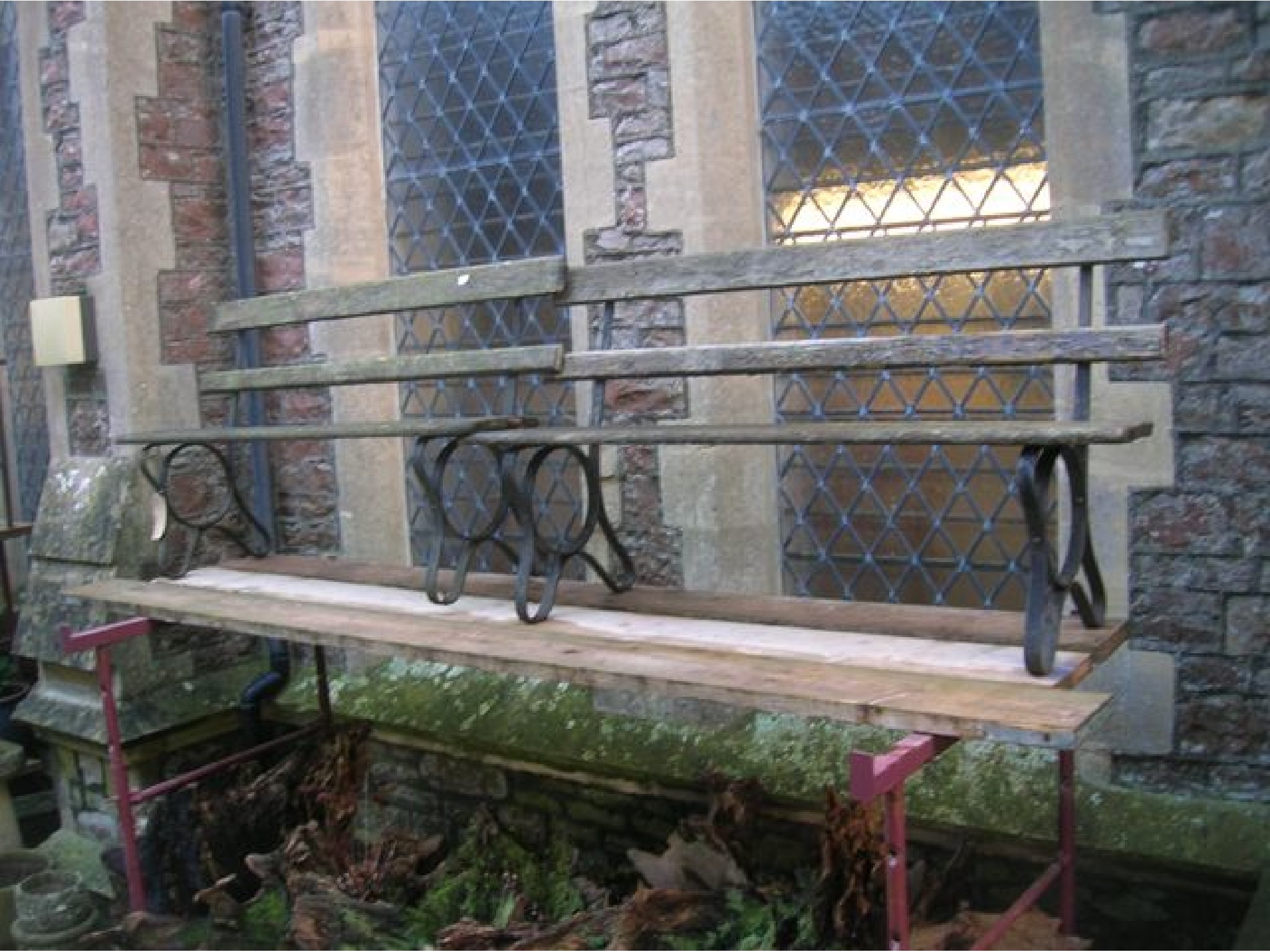 Appraisal: A pair of benches with weathered timber plank seats and