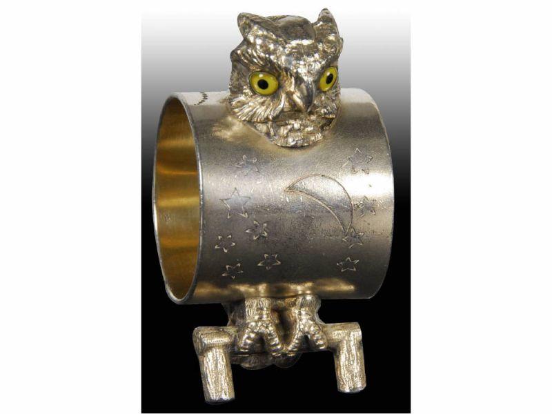 Appraisal: Owl with Glass Eyes Figural Napkin Ring Description Moon and