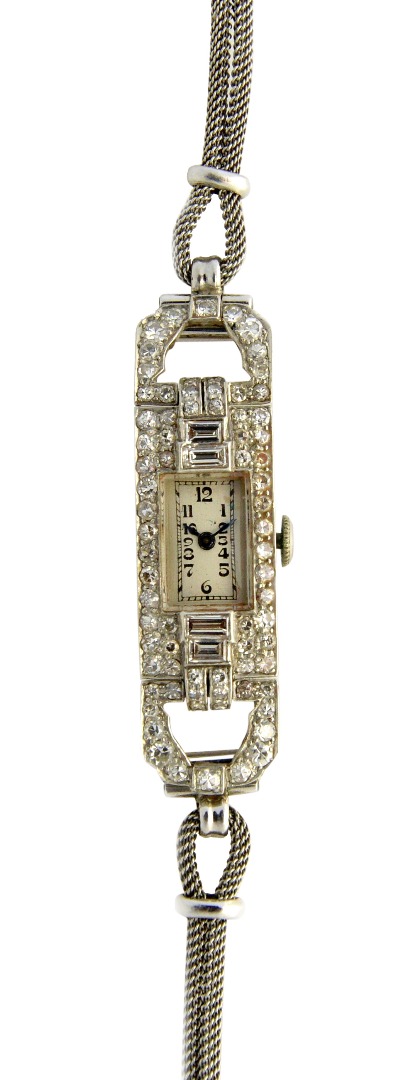 Appraisal: A Mappin Webb lady's diamond set rectangular cased dress wristwatch