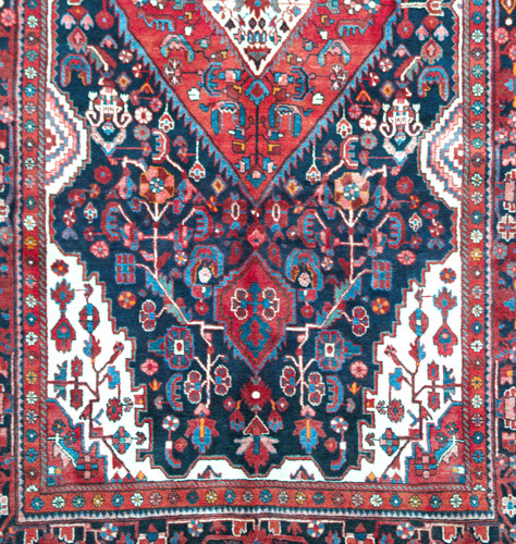 Appraisal: NORTHWEST PERSIAN Area rug with flowers and leaves on a