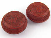 Appraisal: A pair of Chinese carved red lacquer round boxes children